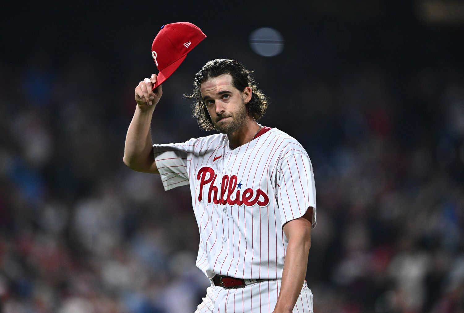Sep 26, 2023; Philadelphia, Pennsylvania, USA; Philadelphia Phillies starting pitcher Aaron Nola (27) tips his cap to the crowd against the Pittsburgh Pirates in the seventh inning at Citizens Bank Park.